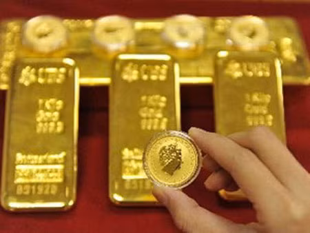 Vàng lùi dần về mốc 1.700 USD/ounce ảnh 1