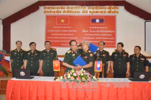 Việt Nam giúp Lào xây dựng trang thông tin điện tử quốc phòng ảnh 1