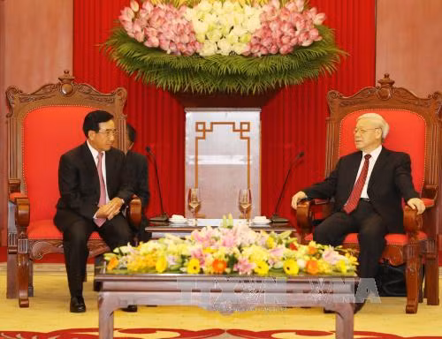 Tổng Bí thư: Việt Nam ủng hộ mạnh mẽ và toàn diện công cuộc đổi mới ở Lào ảnh 1