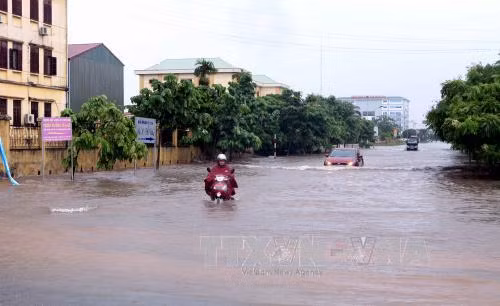 Nhiều địa phương bị ngập nặng sau bão số 2 ảnh 1