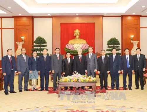 Tổng Bí thư: Việt Nam ủng hộ mạnh mẽ và toàn diện công cuộc đổi mới ở Lào ảnh 2