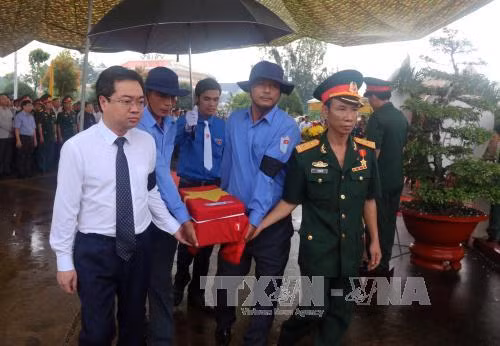 Truy điệu và an táng hài cốt liệt sĩ quân tình nguyện, chuyên gia Việt Nam hy sinh tại Campuchia ảnh 1