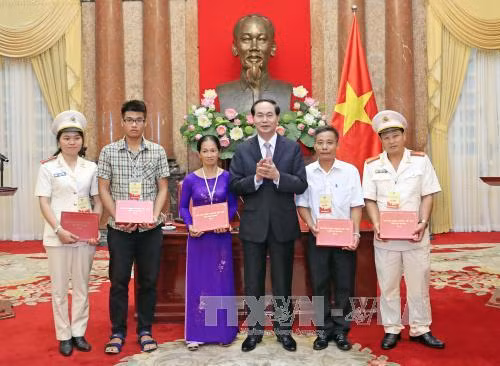Chủ tịch nước gặp mặt Đoàn đại biểu thương binh, thân nhân liệt sĩ lực lượng Cảnh sát nhân dân ảnh 2