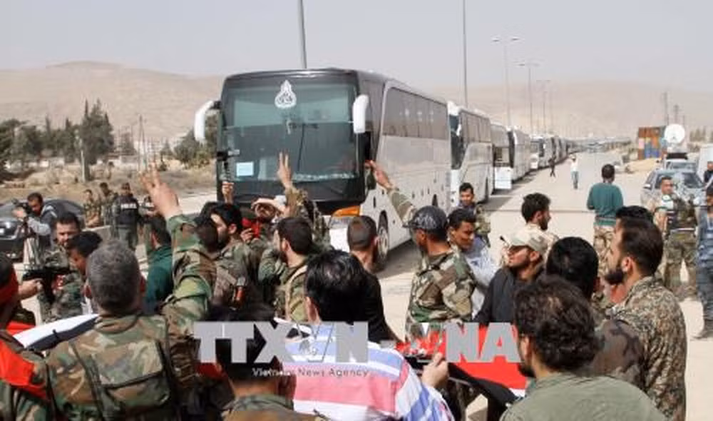 Chính quyền Syria đạt thỏa thuận cho phép phiến quân rút khỏi Douma ảnh 1