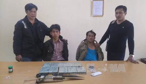 Bắt quả tang 2 đối tượng vận chuyển 10 bánh heroin ảnh 1