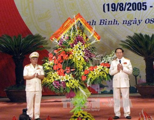 Bộ trưởng Trần Đại Quang dự kỷ niệm 70 năm Ngày truyền thống CAND ảnh 1