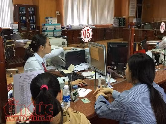Tín dụng khó đạt mục tiêu tăng trưởng 21 - 22% vào cuối năm ảnh 1