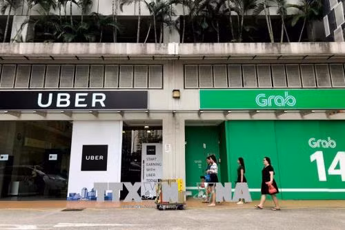 Singapore thông báo điều tra thỏa thuận Grab mua lại Uber ảnh 1
