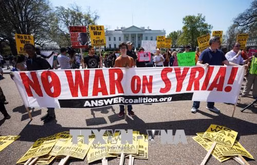 Biểu tình tại nhiều thành phố Mỹ phản đối chiến dịch không kích Syria ảnh 1