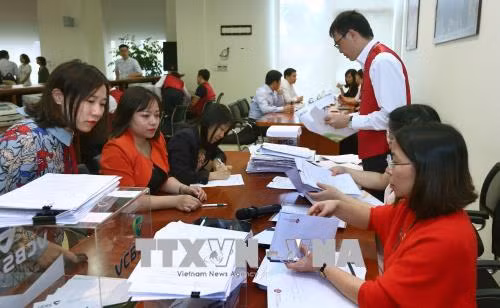 Thu hơn 9.800 tỷ đồng qua hoạt động đấu giá ảnh 1