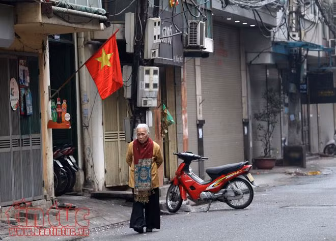 Khoảng khắc yên bình của Hà Nội ngày đầu năm mới ảnh 7