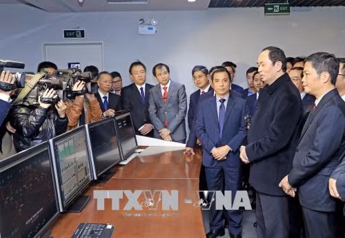 Chủ tịch nước Trần Đại Quang thăm, chúc Tết các đơn vị trong đêm Giao thừa ảnh 3