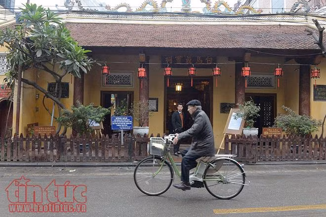 Khoảng khắc yên bình của Hà Nội ngày đầu năm mới ảnh 4