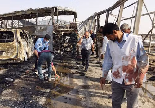 Loạt vụ tấn công đẫm máu tại Iraq làm gần 180 người thương vong ảnh 1