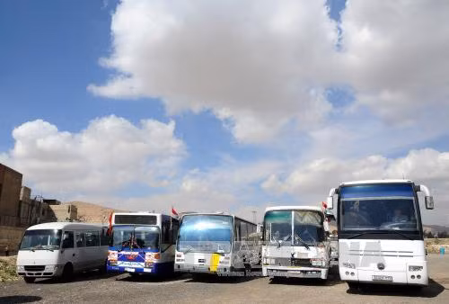 Đoàn xe chở hàng cứu trợ quốc tế tới Đông Ghouta, Syria ảnh 1