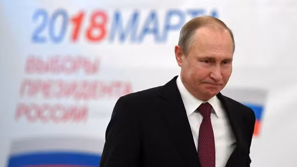 Chùm ảnh Tổng thống Nga Putin và các đối thủ đi bỏ phiếu ảnh 3