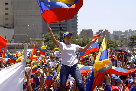 Người Venezuela ủng hộ chính phủ của Tổng thống Maduro ảnh 1