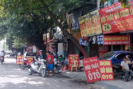 Hà Nội triệt phá cơ sở làm giả biển số xe ảnh 1