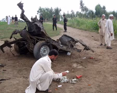 Xe khách trúng bom, 14 người Pakistan thiệt mạng ảnh 1
