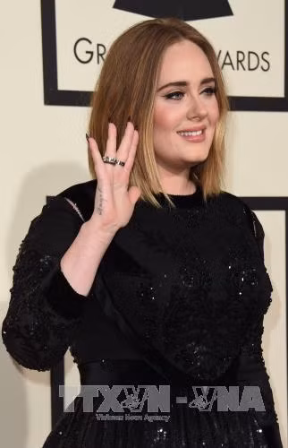 Adele ký hợp đồng thu âm lớn nhất lịch sử với Sony ảnh 1