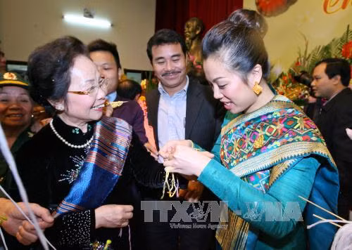 Thắm thiết tình anh em Việt - Lào trong Tết Bun Pi May ảnh 1