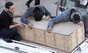 Cảnh sát Iraq ôm chặt kẻ đánh bom tự sát để cứu người