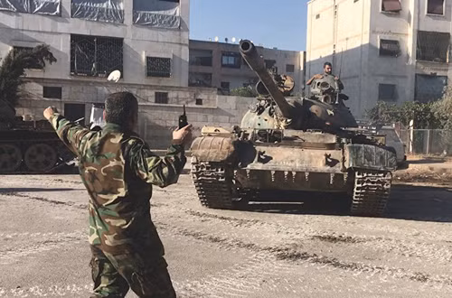Lần đầu tiên quân đội Syria bắt tay lực lượng nổi dậy chống IS ảnh 1