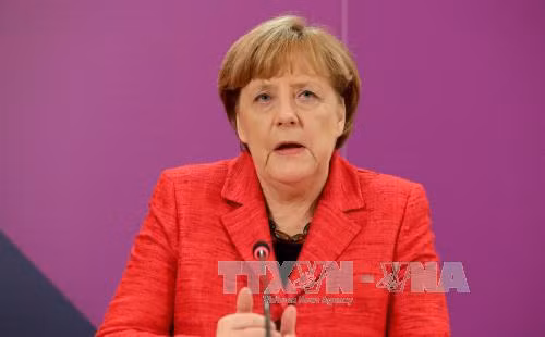 Cuộc tranh cử khó khăn của bà Merkel ảnh 1