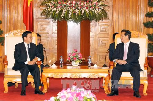Lãnh đạo Nhà nước tiếp đoàn đại biểu Ban đối ngoại Trung ương Lào ảnh 1