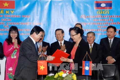 Việt-Lào ký Hiệp định Thương mại song phương ảnh 1