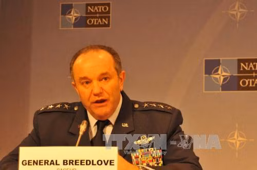 NATO chưa xác nhận rút vũ khí hạng nặng ở Đông Ukraine ảnh 1
