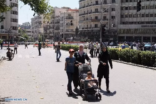 Cuộc sống trong bom đạn của người Syria ảnh 9