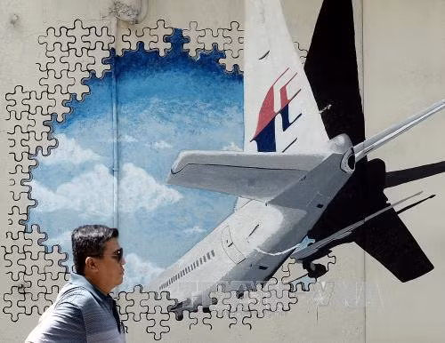Malaysia ký thỏa thuận nối lại chiến dịch tìm kiếm máy bay MH370 ảnh 1