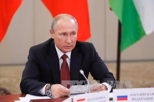 Tổng thống V.Putin khẳng định các lệnh trừng phạt Nga sẽ dần được dỡ bỏ ảnh 1