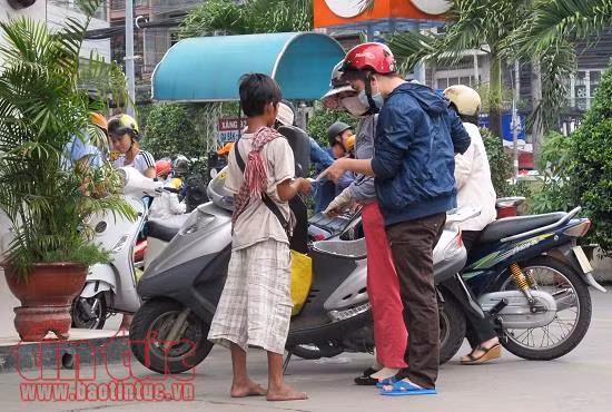 Người ăn xin, lang thang ‘tái xuất’ tại TP Hồ Chí Minh ảnh 1