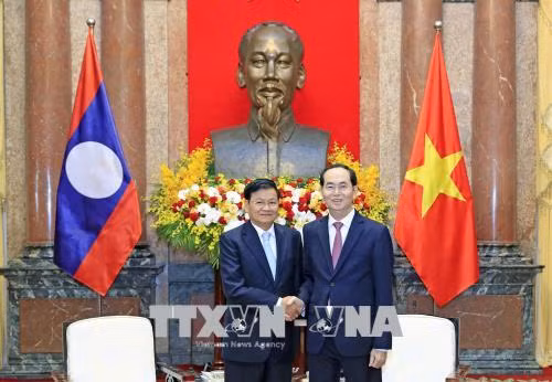 Chủ tịch nước Trần Đại Quang tiếp Thủ tướng Lào Thongloun Sisoulith ảnh 1