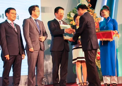 Vinamilk đoạt giải xuất sắc Báo cáo thường niên năm 2014 ảnh 1