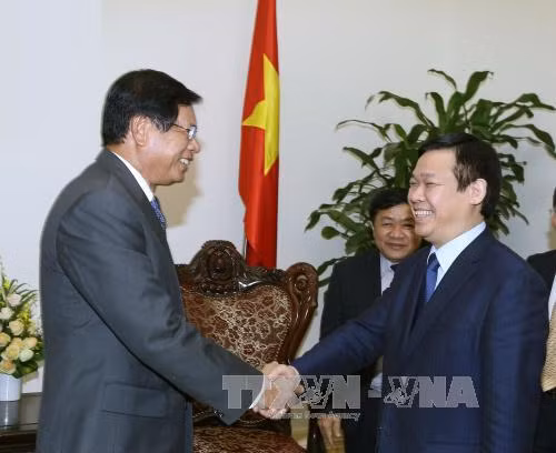 Việt Nam ủng hộ hợp tác nghiên cứu chính sách kinh tế với Lào ảnh 1