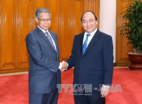 Việt Nam rất coi trọng phát triển quan hệ với Malaysia ảnh 1