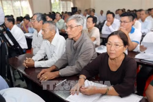 Cử tri xã Phú Mỹ Hưng, huyện Củ Chi tại buổi tiếp xúc. Ảnh: Thanh Vũ-TTXVN