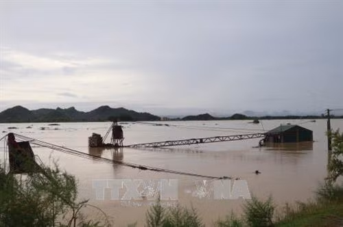 Mực nước tại sông Hoàng Long khu vực bến Đế chiều 11/10 đạt mức 4,73 m. Ảnh: Ninh Đức Phương - TTXVN