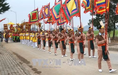 Nghi lễ rước kiệu tại lễ hội. Ảnh: Trung Kiên - TTXVN