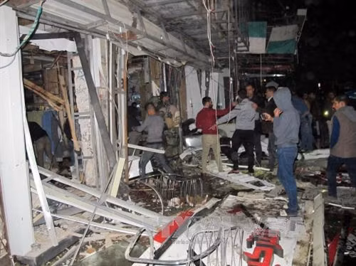 Hiện trường vụ tấn công ở đông Baghdad. AFP/TTXVN