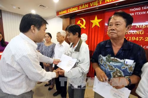 Thông tấn xã Việt Nam tổ chức Lễ kỷ niệm 70 năm Ngày Thương binh – Liệt sĩ ảnh 9