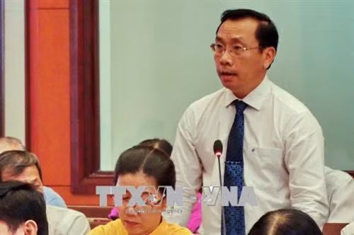 Đồng chí Ngô Thành Tuấn, Bí thư Quận ủy Quận 8, tham gia thảo luận tại hội nghị. Ảnh : Thế Anh-TTXVN