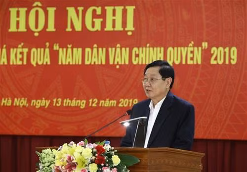 Trong ảnh: Ủy viên Trung ương Đảng, Bộ trưởng Bộ Nội vụ Lê Vĩnh Tân báo cáo tại hội nghị. Ảnh: Văn Điệp - TTXVN