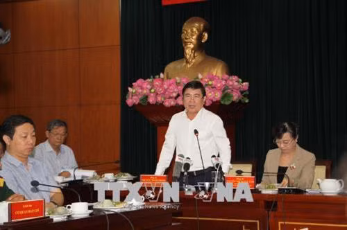 Chủ tịch UBND Thành phố Hồ Chí Minh Nguyễn Thành Phong phát biểu tại buổi gặp gỡ. Ảnh: Thanh Vũ-TTXVN
