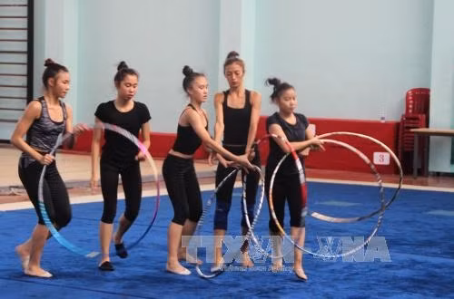 Đội tuyển thể dục nghệ thuật quốc gia tập luyện tại Trung tâm thể dục thể thao Hoa Lư, Quận 1, Thành phố Hồ Chí Minh. Ảnh: Xuân Dự - TTXVN.