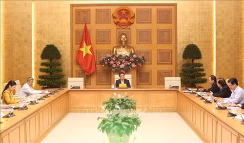 Phó Thủ tướng Vũ Đức Đam, Chủ tịch Ủy ban chủ trì cuộc họp. Ảnh: Dương Giang - TTXVN