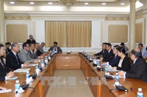 Chủ tịch UBND Thành phố Hồ Chí Minh Nguyễn Thành Phong tiếp Phó Thống đốc tỉnh Hakaido - Nhật Bản ông Tsuji Yasuhiiro. Ảnh: Thanh Vũ-TTXVN